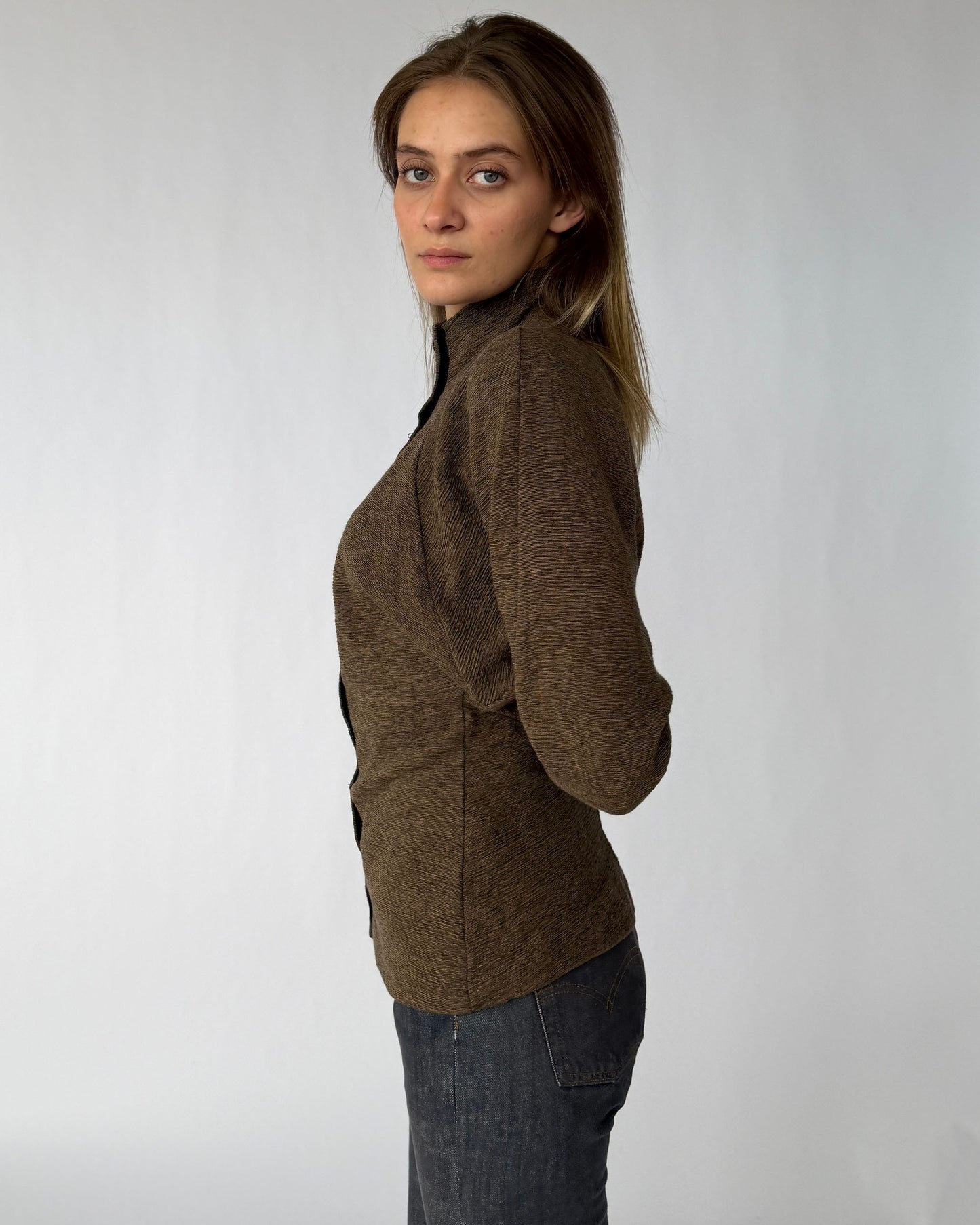 Side view of Betsey Johnson '80s punk label long sleeve top with buttons and oversized sleeves