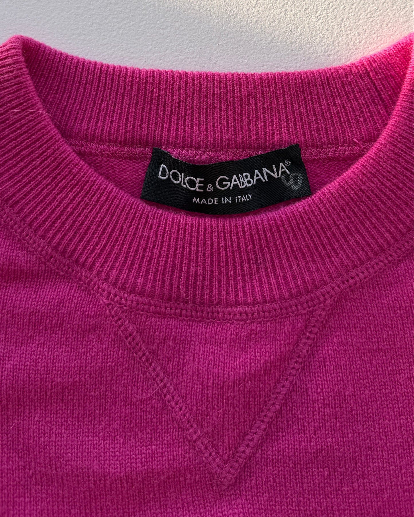 Label on vintage Dolce & Gabbana pink cashmere sweater