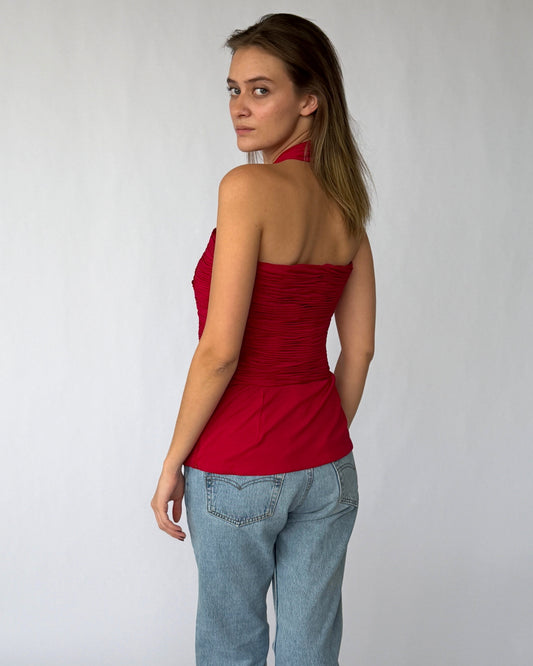 Side view of vintage Gucci corset with ruched bodice