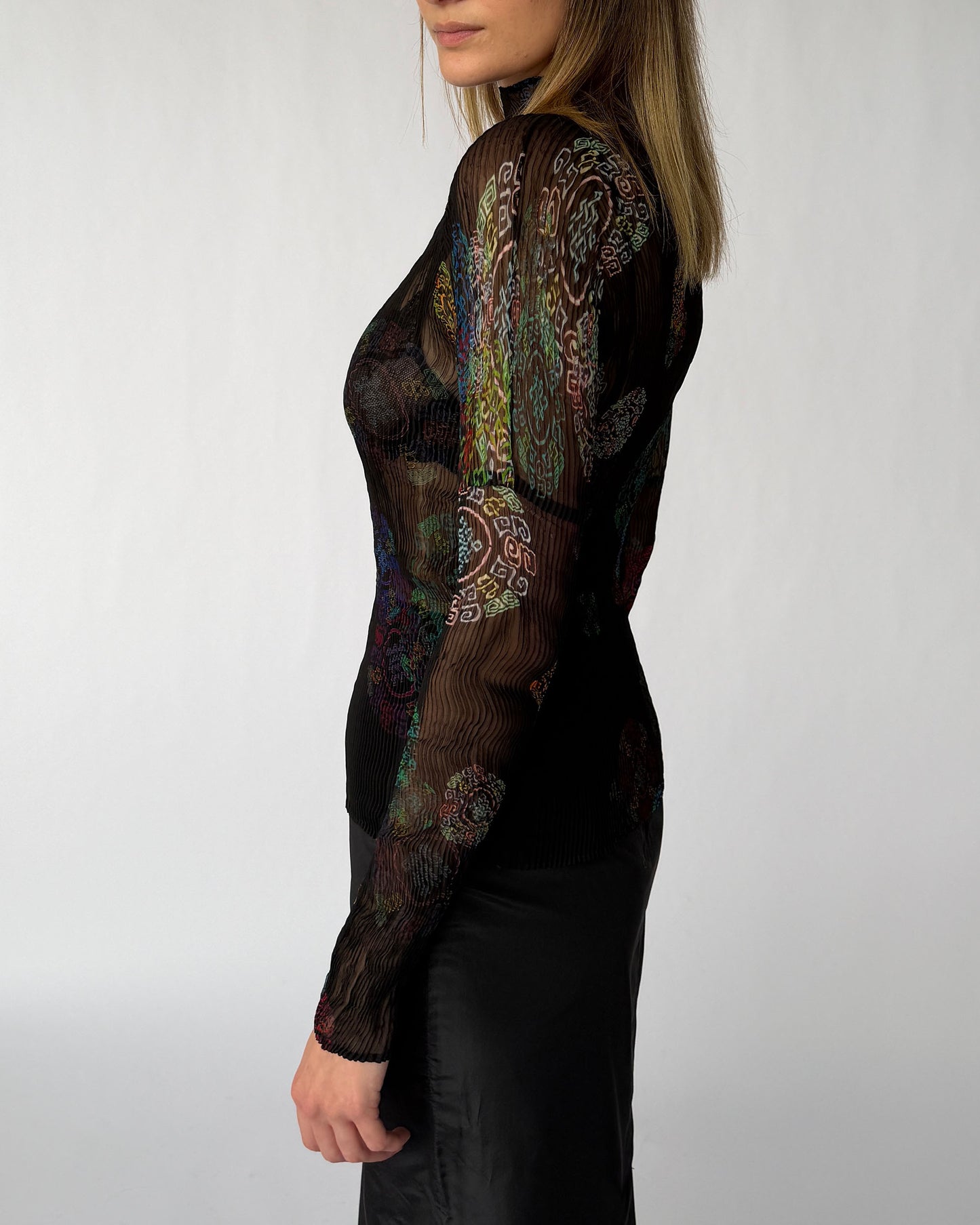 Side view of Issey Miyake Fete Collection Long-Sleeve Mock-Neck Sheer Blouse with multicolor print