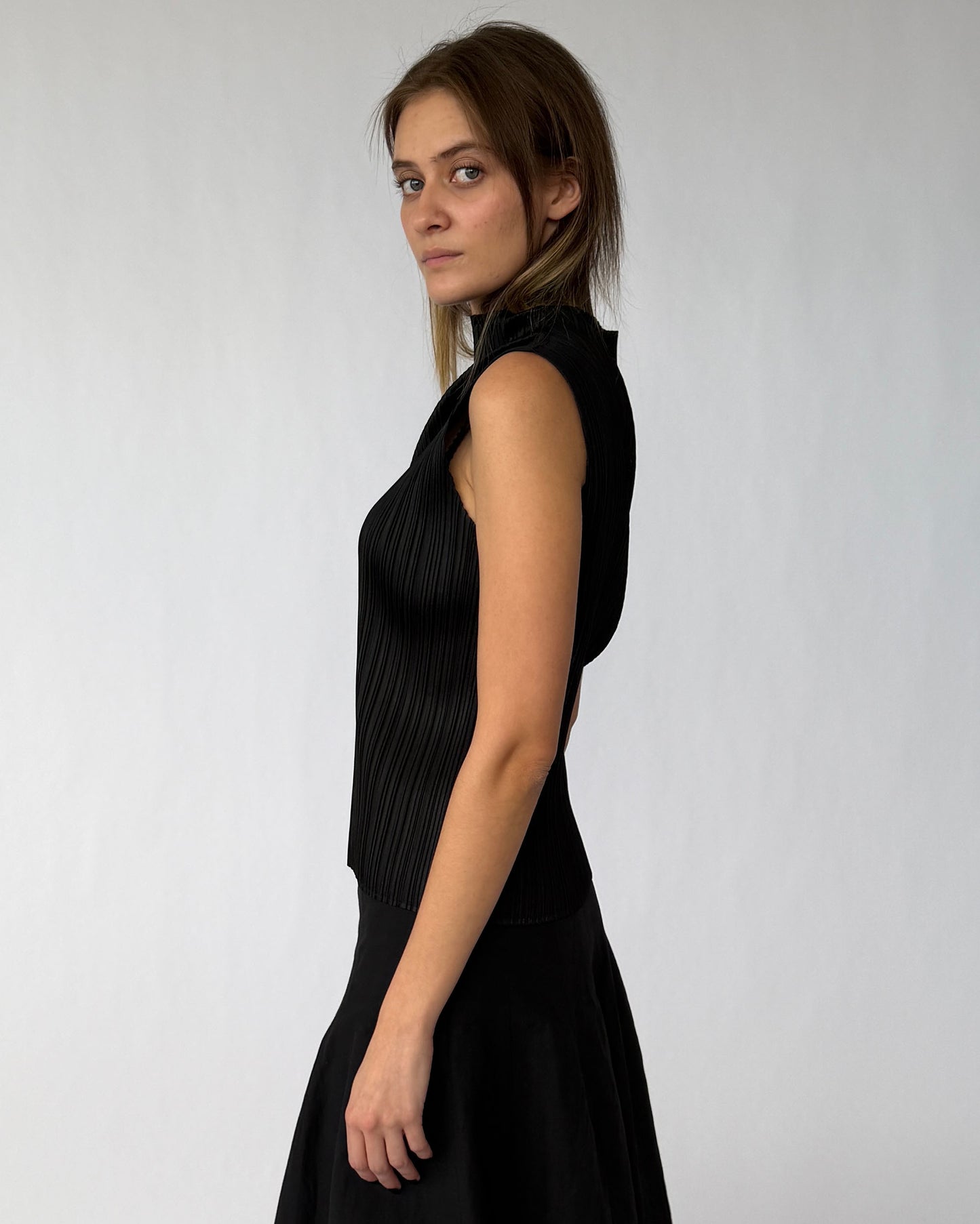 Side view of Issey Miyake Pleats Please sleeveless top