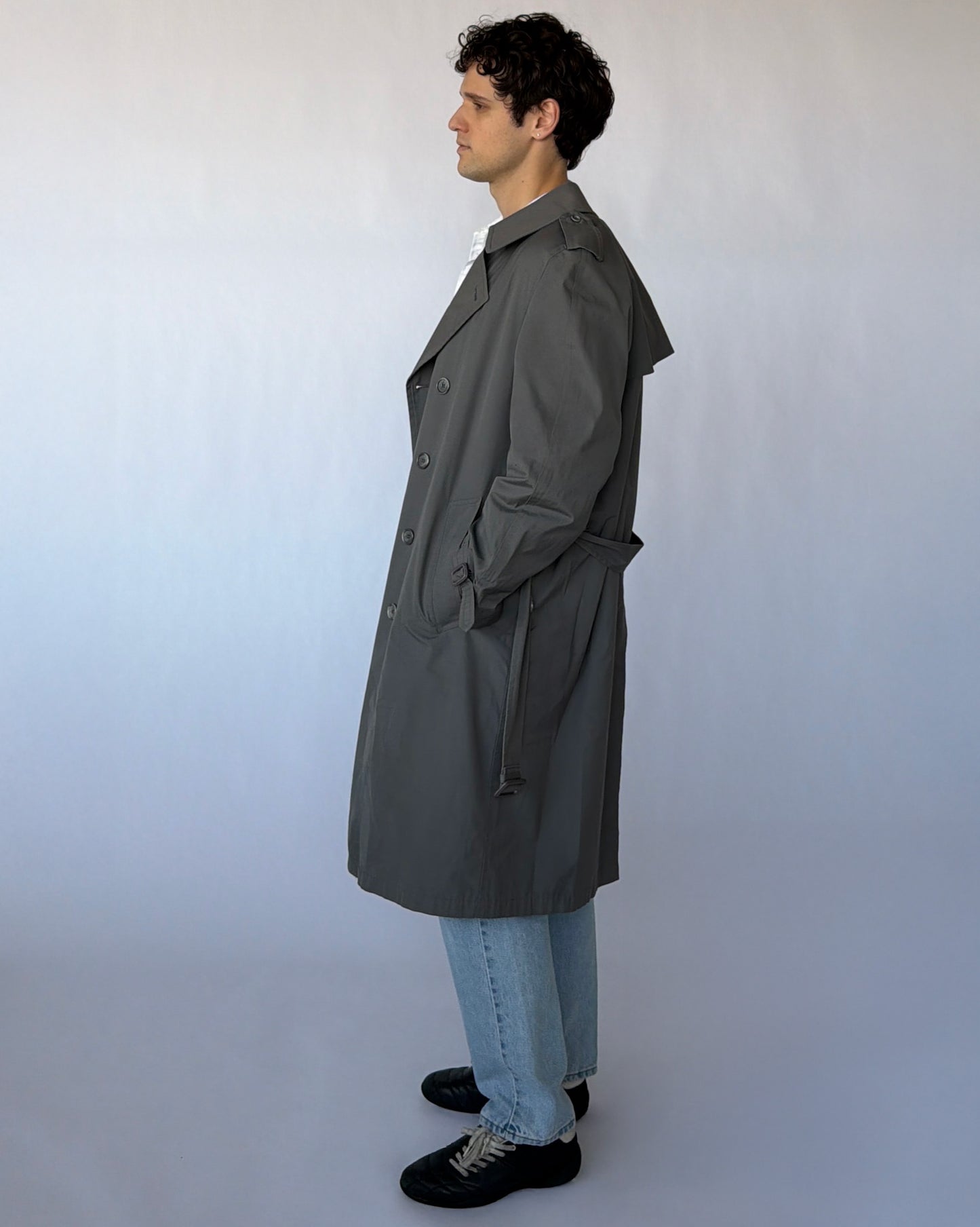 Side view of London Fog grey trench coat with belt