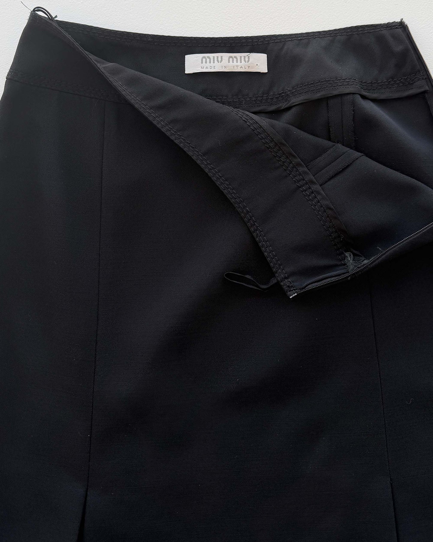 Miu Miu label on vintage pleated skirt