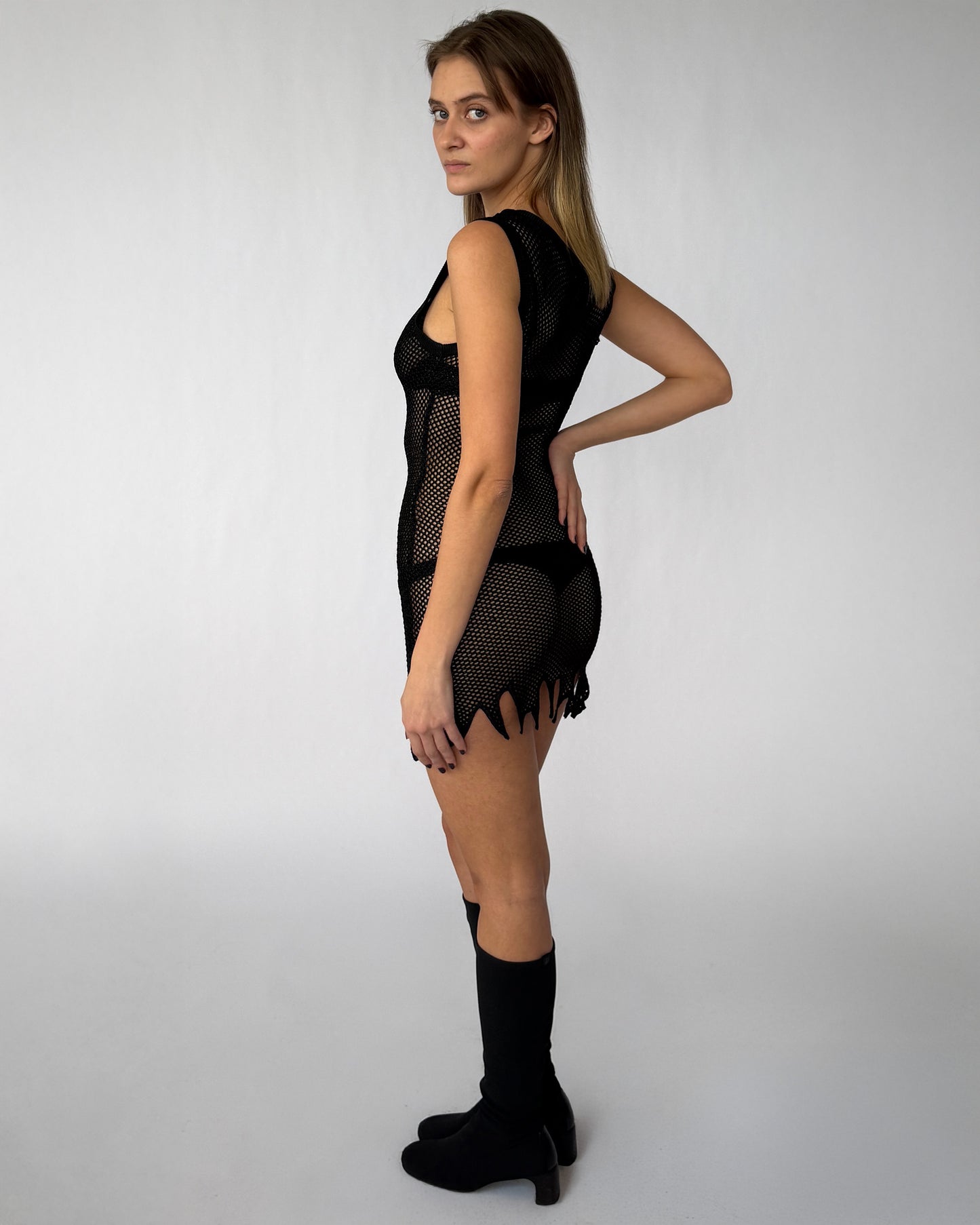Side view of '90s Rifat Ozbek mesh mini dress