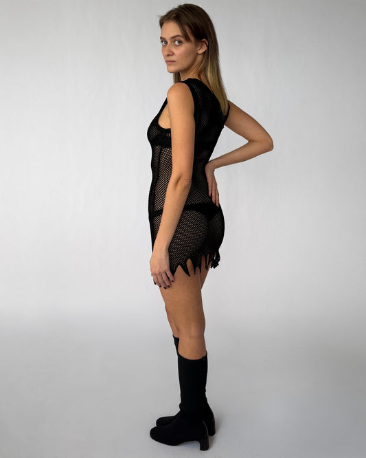 Side view of '90s Rifat Ozbek mesh mini dress