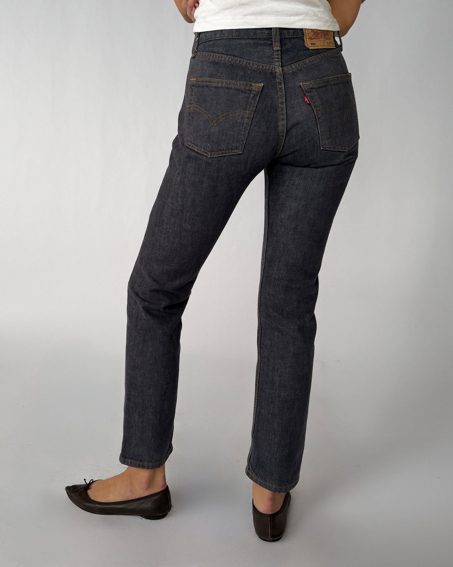 Back view of vintage Levis 501 jeans in dark wash