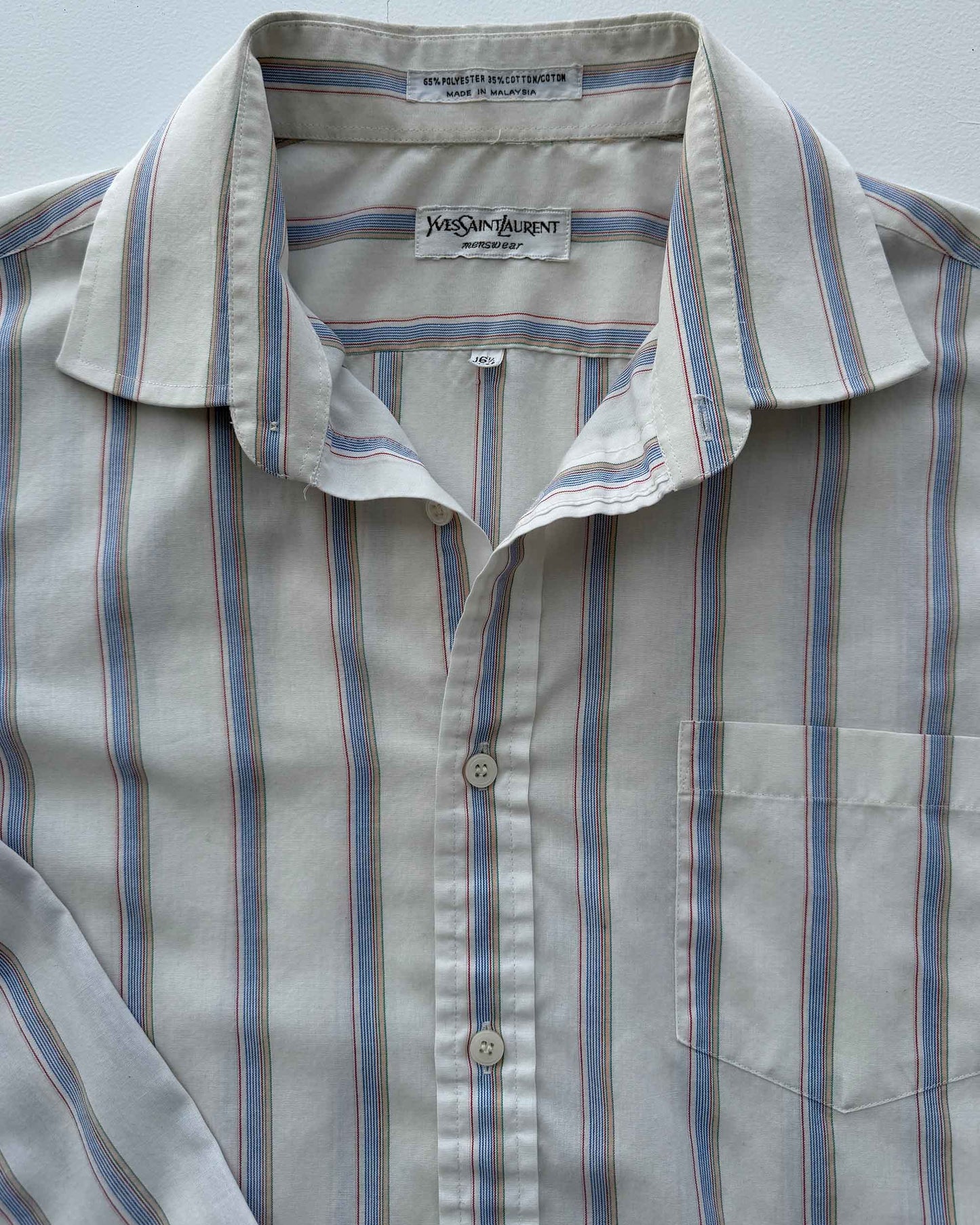 Yves Saint Laurent label on multicolor striped button up shirt
