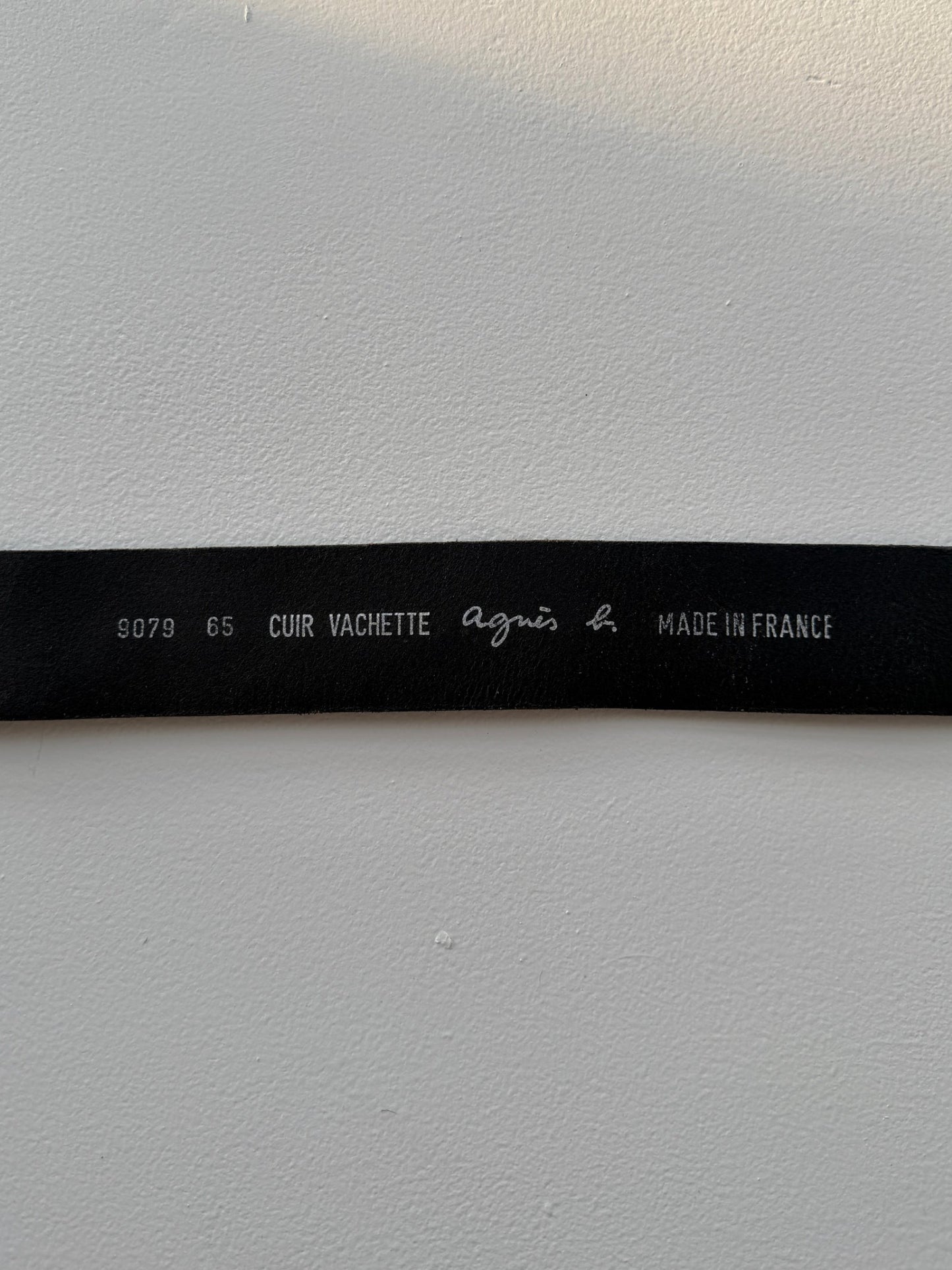 Interior stamp of Agnès B. logo on vintage leather belt
