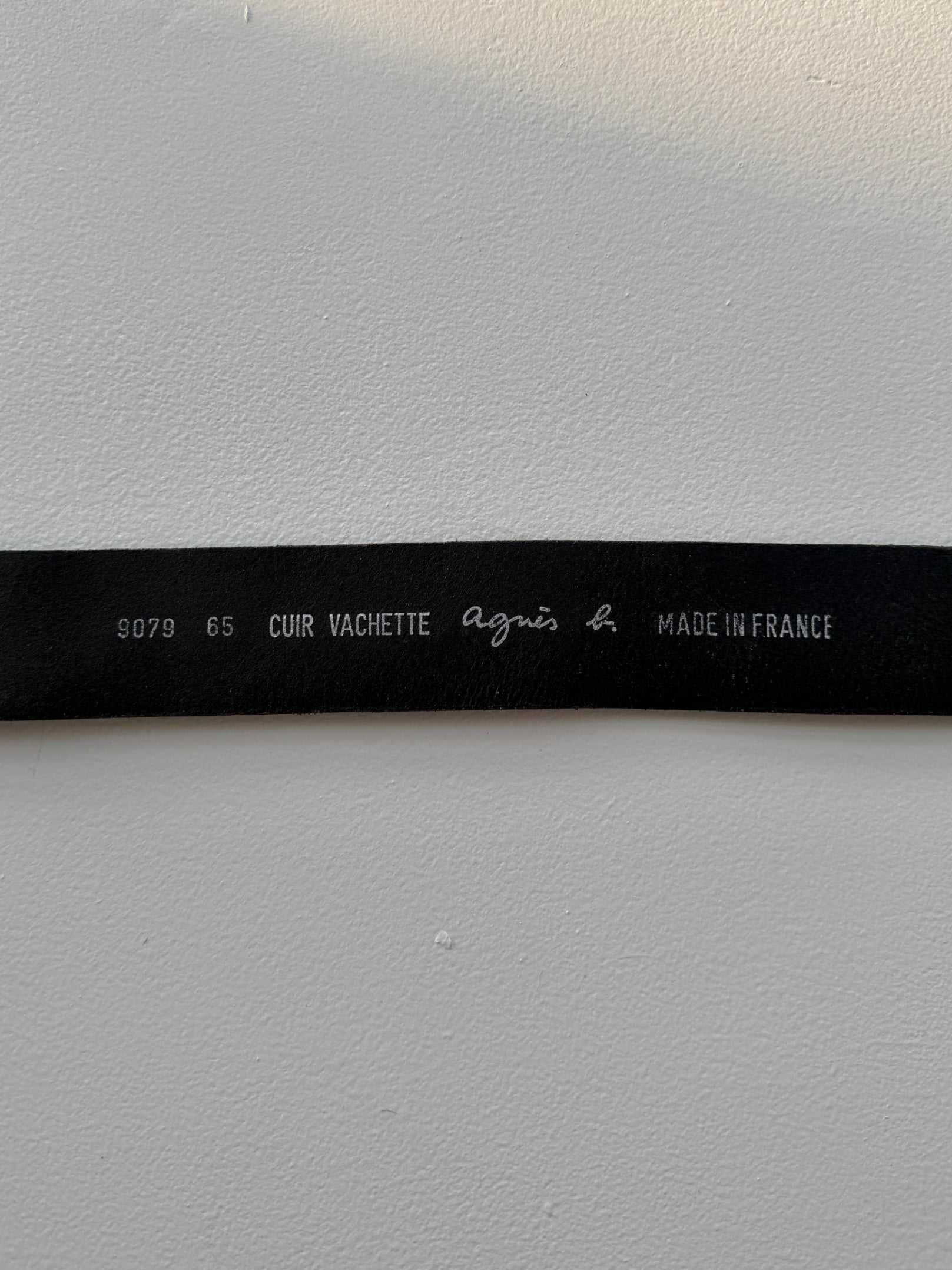 Interior stamp of Agnès B. logo on vintage leather belt
