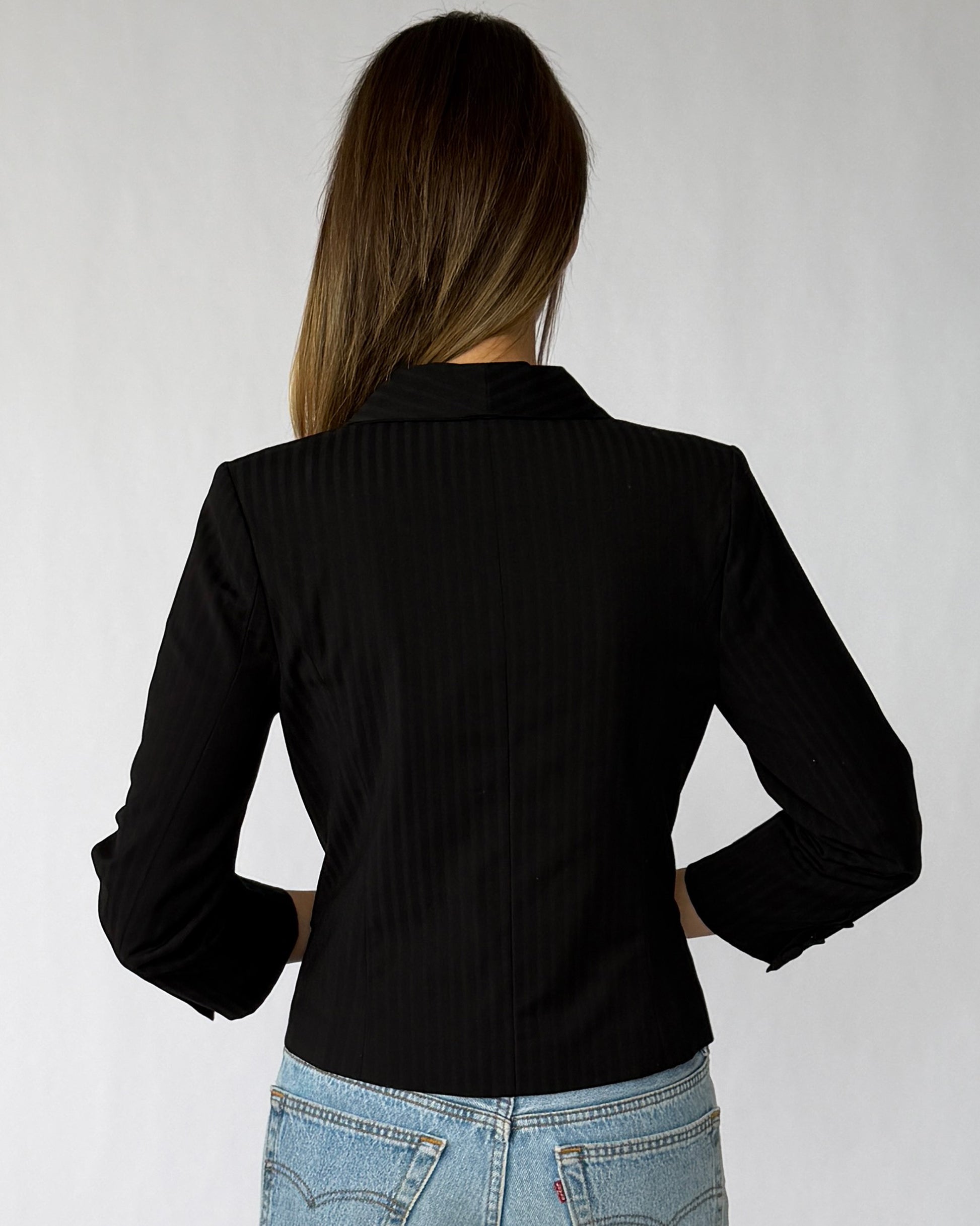 Back view of vintage Alexander McQueen pinstripe blazer