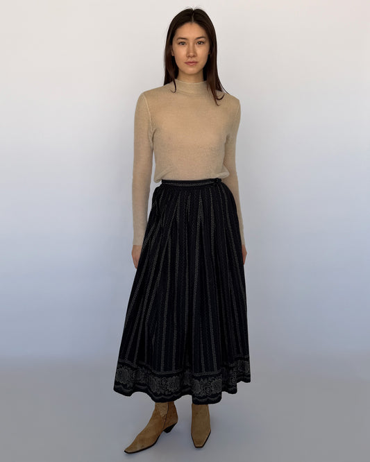 Agnès B. midi skirt with vertical stitched detailing and floral embroidered border hem