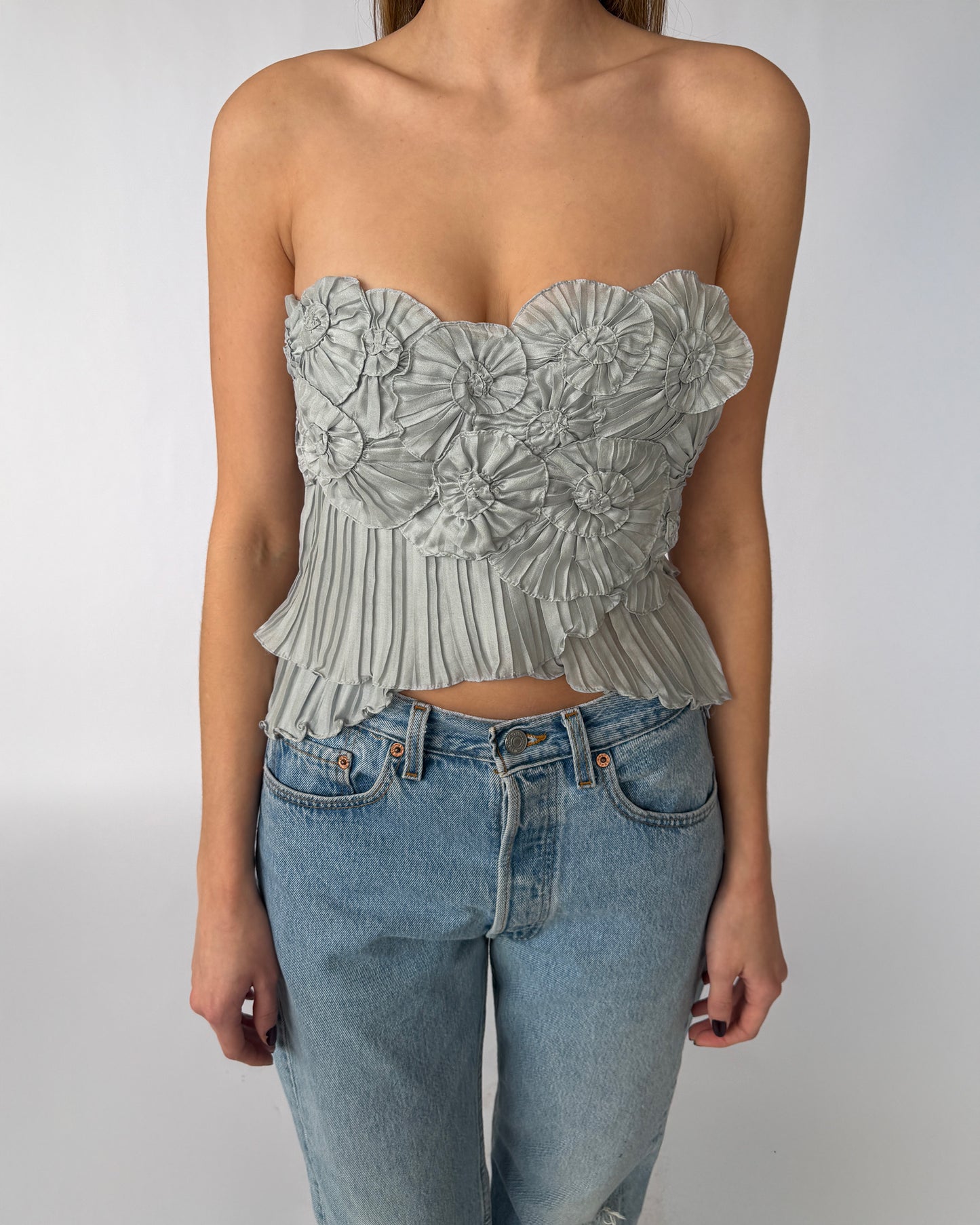 BCBGMAXAZRIA sculptural strapless top with floral bodice detail