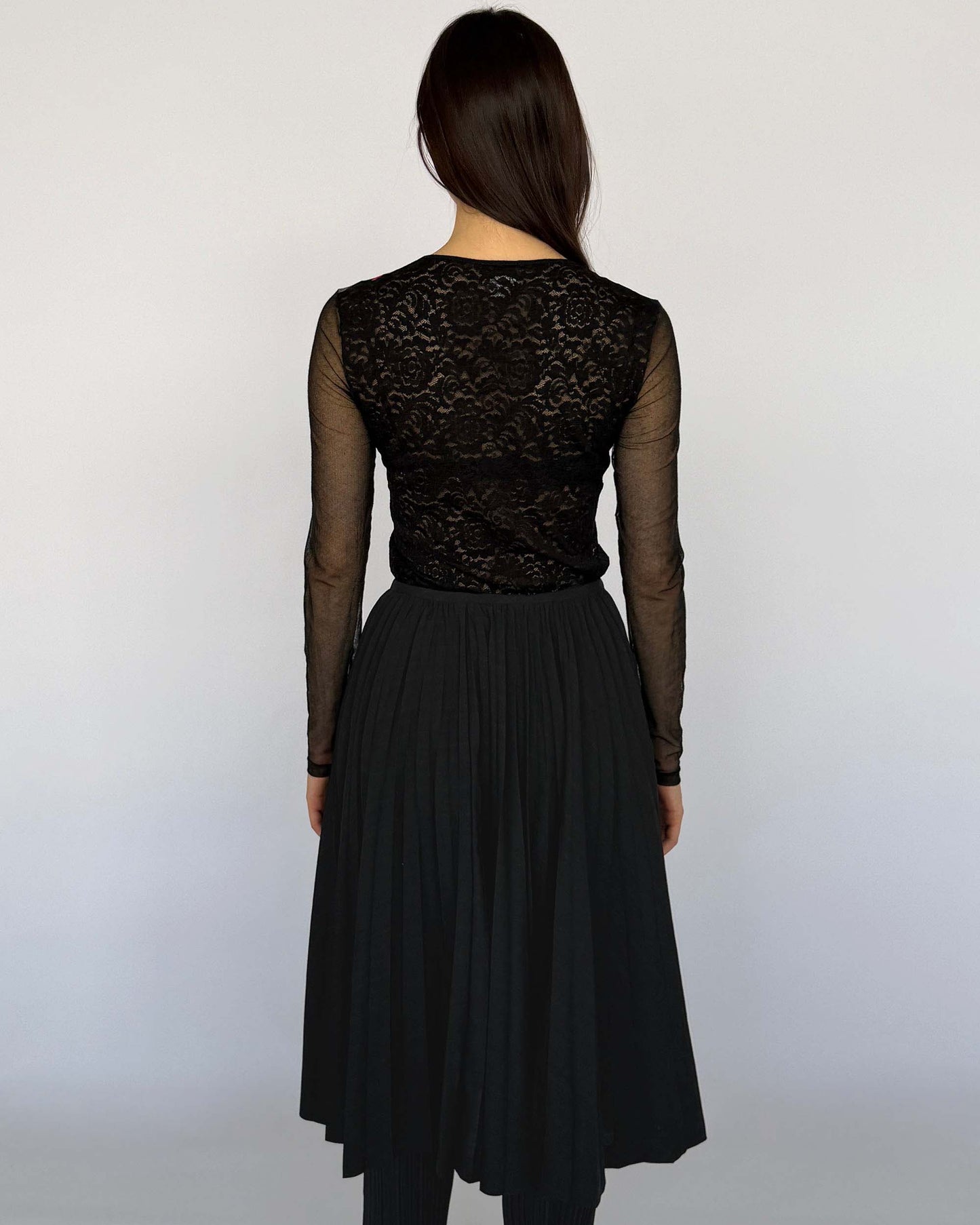 Back view of Comme des Garçon Black Wool Pleated Skirt