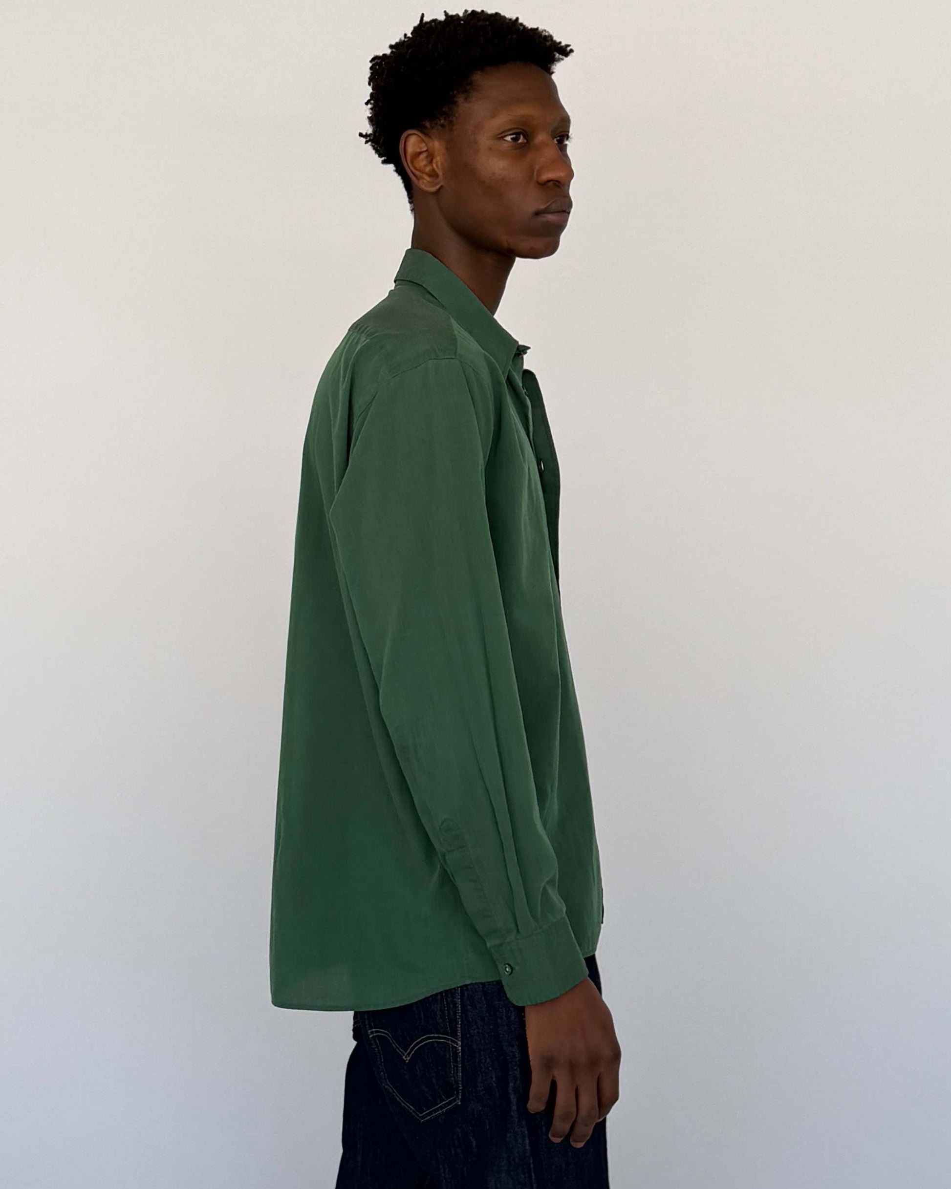 Side view of Christian Dior Green Button Up 