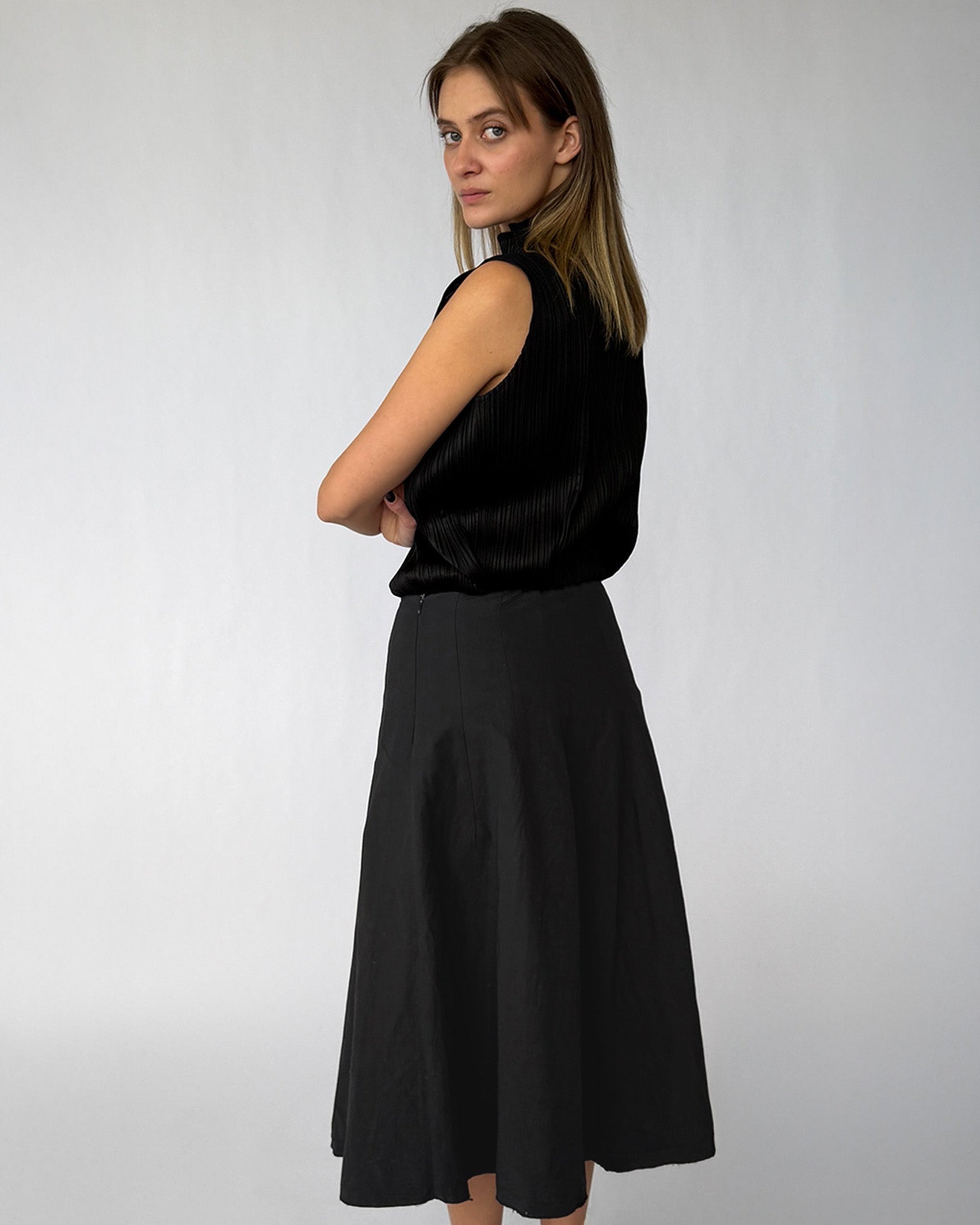 Side view of Vintage Dries Van Noten Raw Hem Mid-Length Skirt