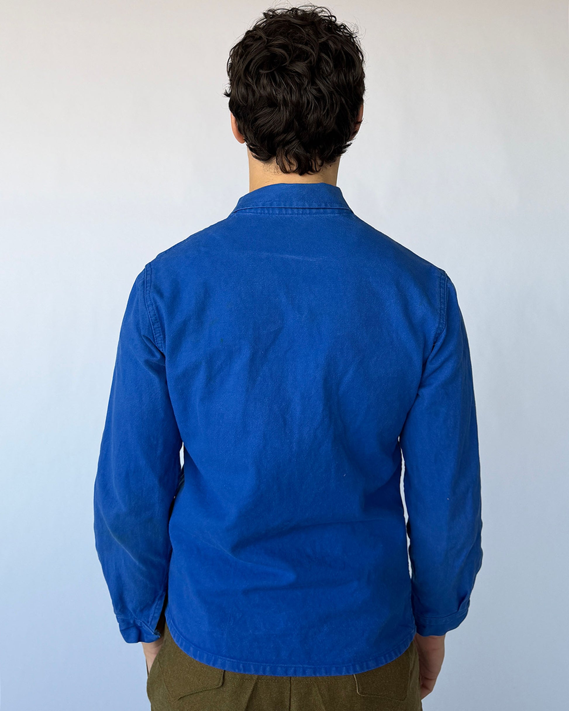 Back view of vintage French chore coat