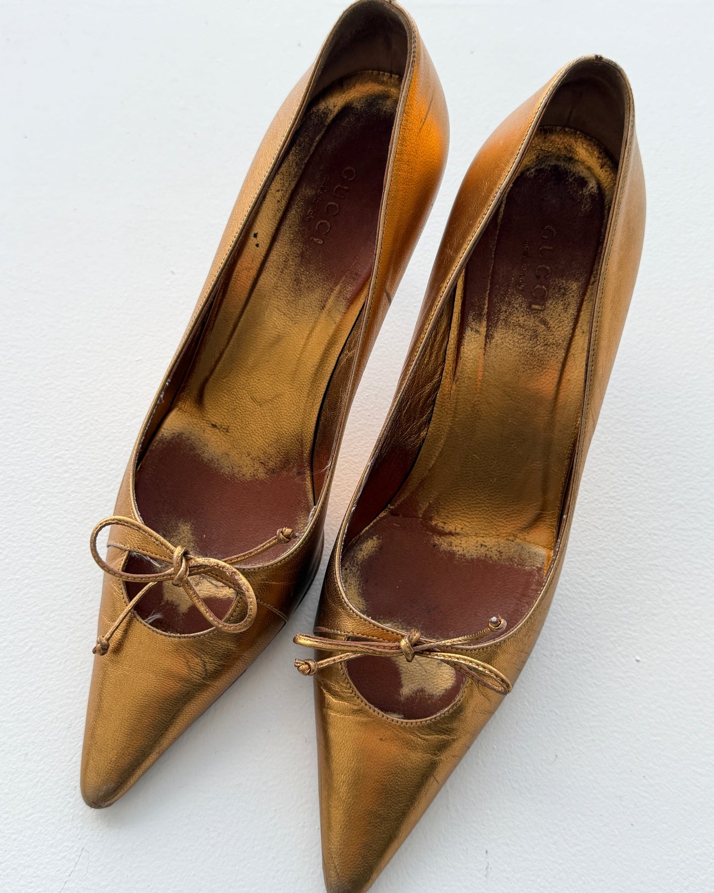 Detail view of Gucci Gold Leather Heels
