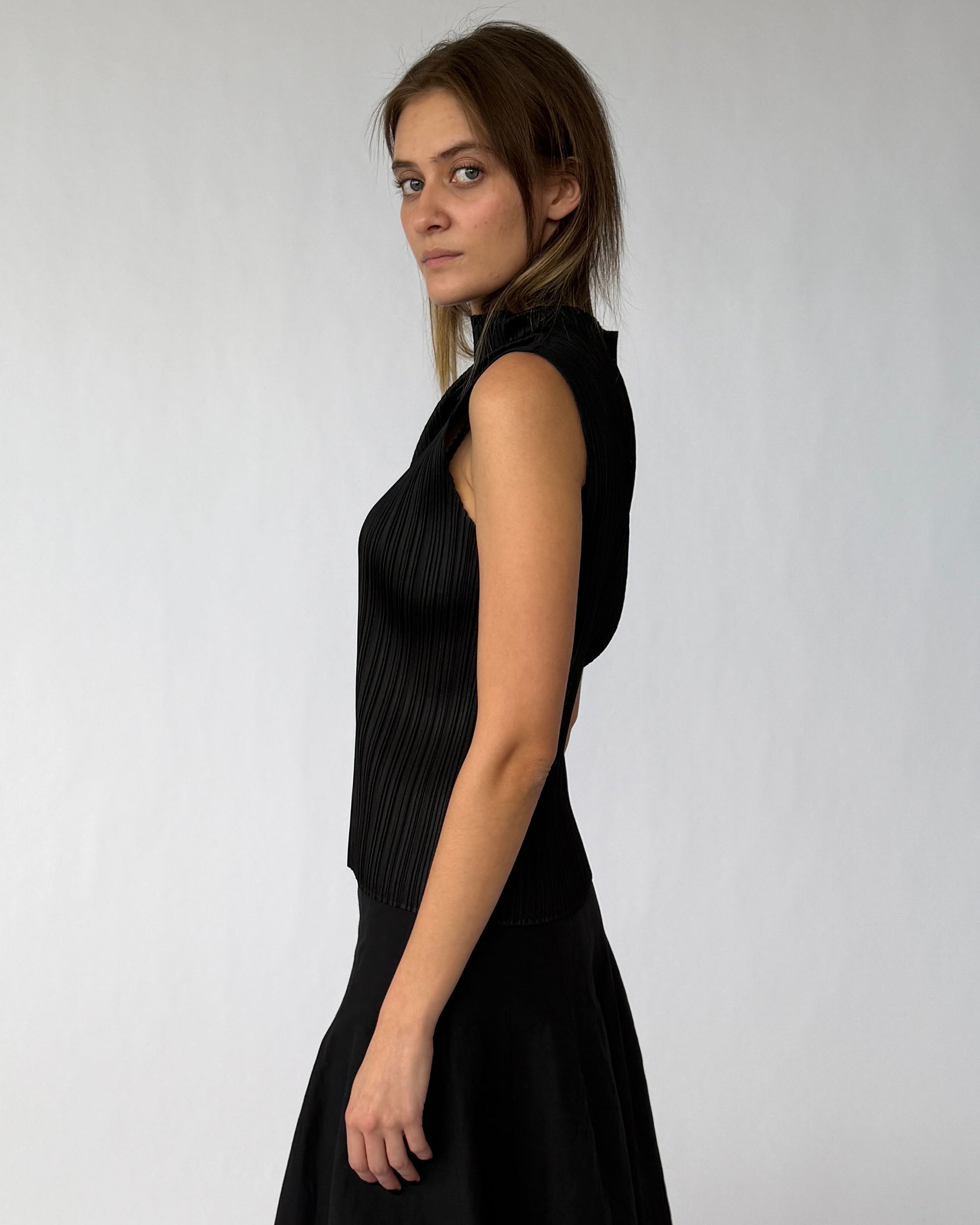 Side view of Issey Miyake Pleats Please sleeveless top 