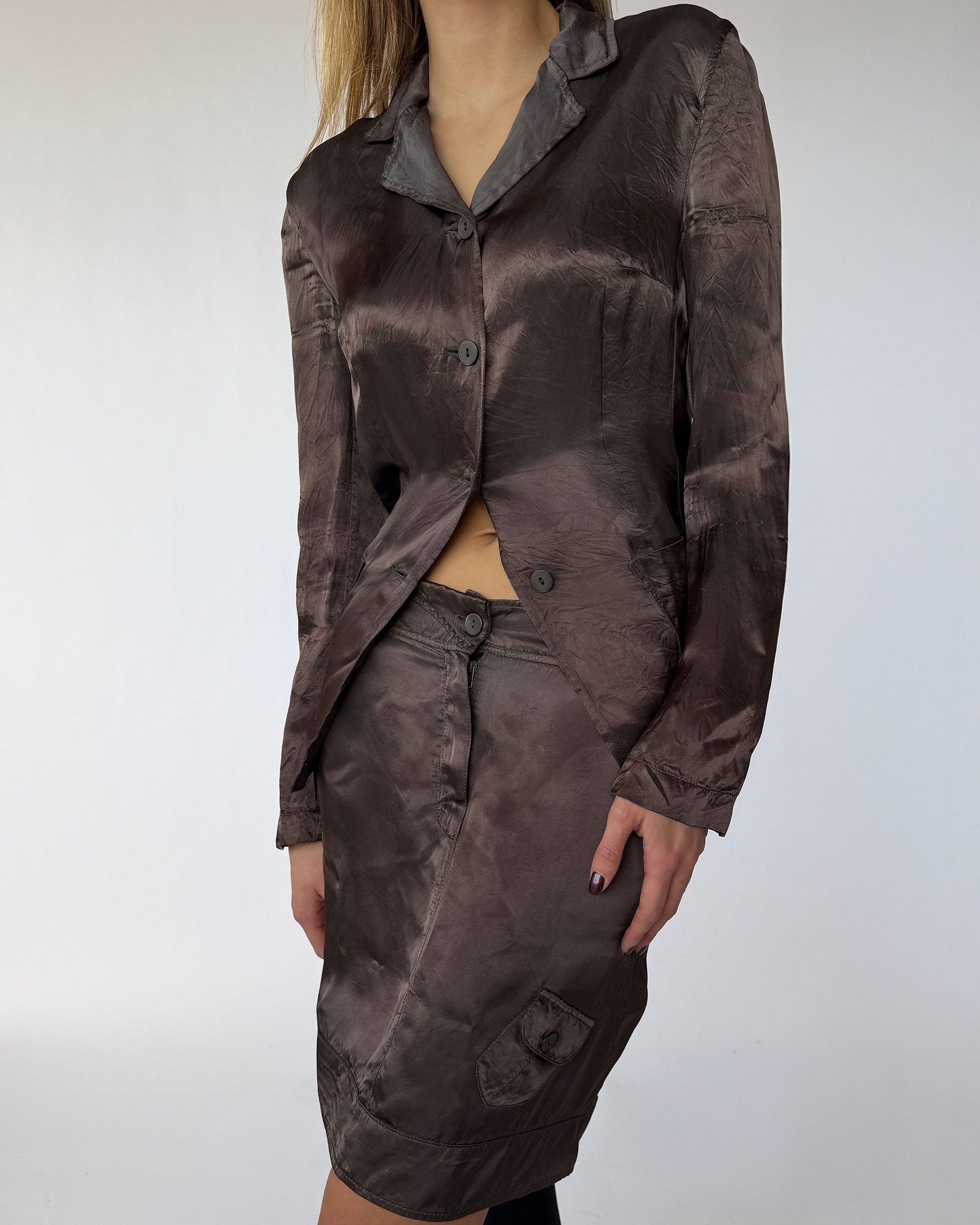 Close-up view of vintage Miu Miu skirt and jacket set in brown