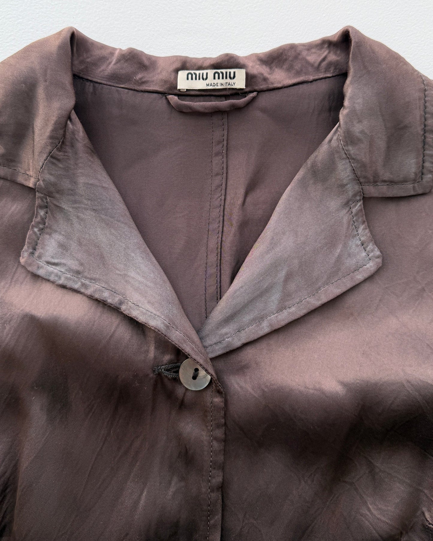 Label on vintage Miu Miu jacket and skirt set