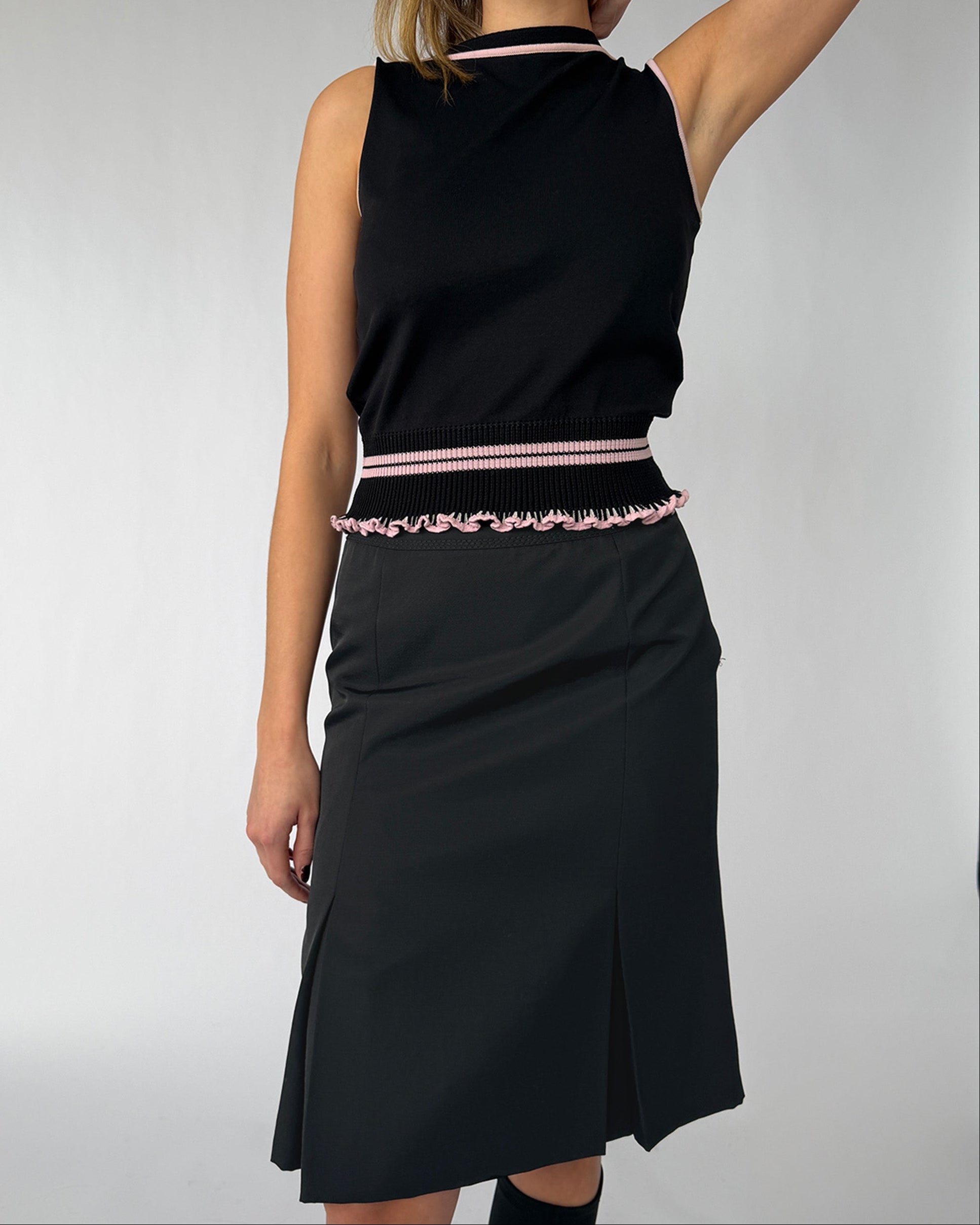 Close-up view of vintage Miu Miu pleated knee-length skirt