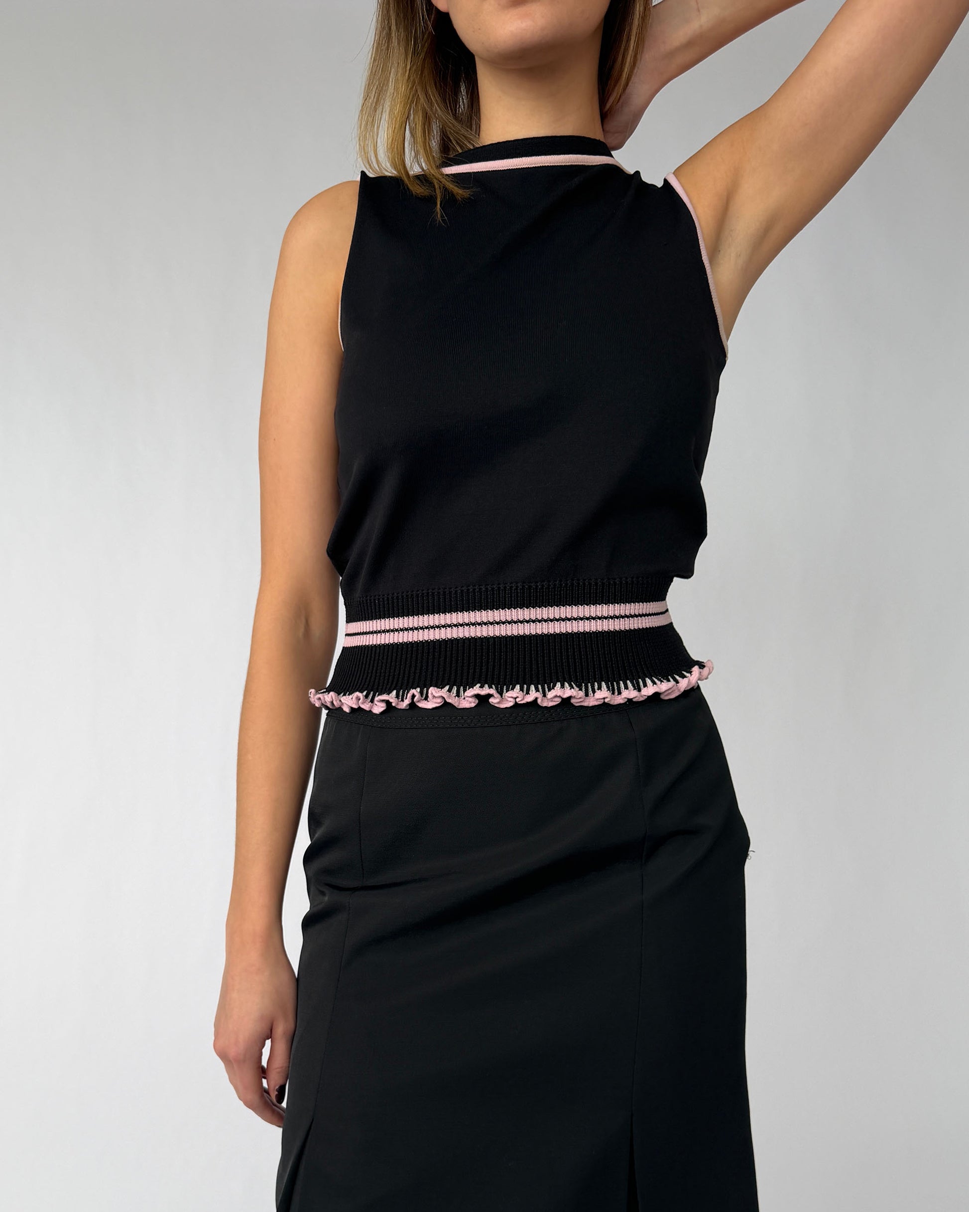 Close up view of vintage Miu Miu sleeveless top with pink accent details