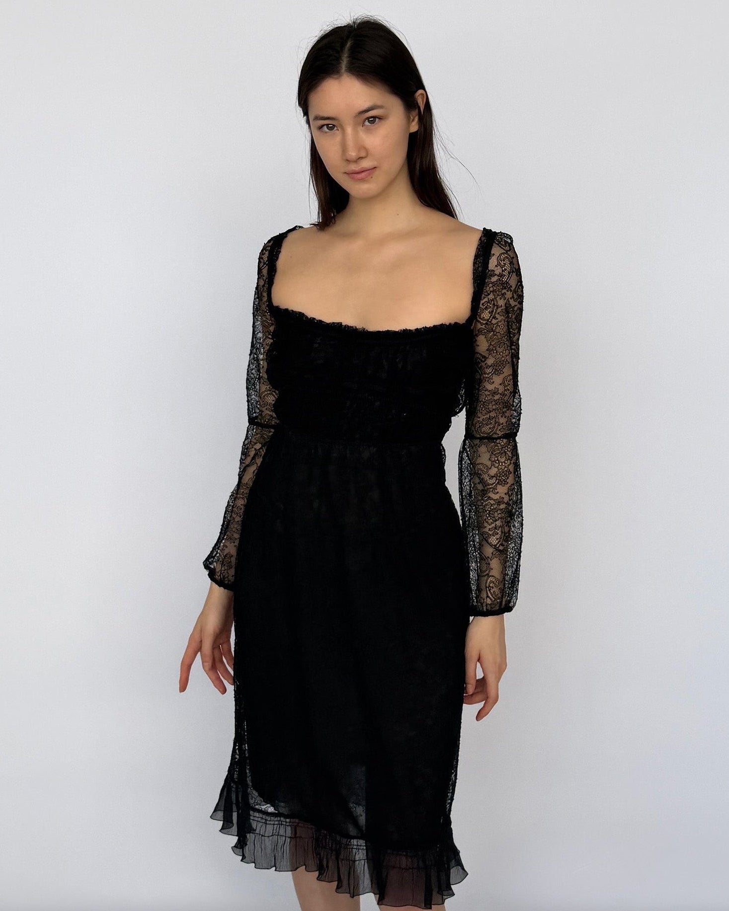 Prada black lace midi dress from early 2000s worn on model