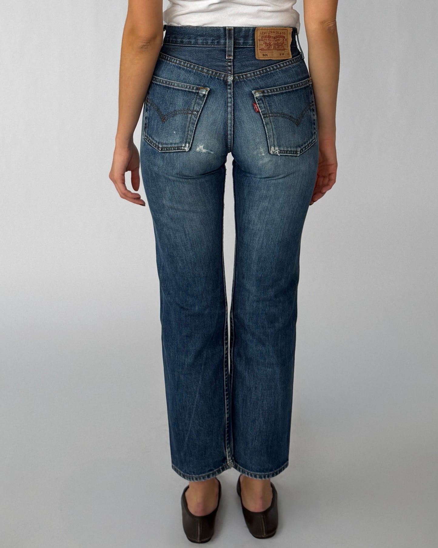 Back view of vintage Levi's 501 jeans in a medium wash