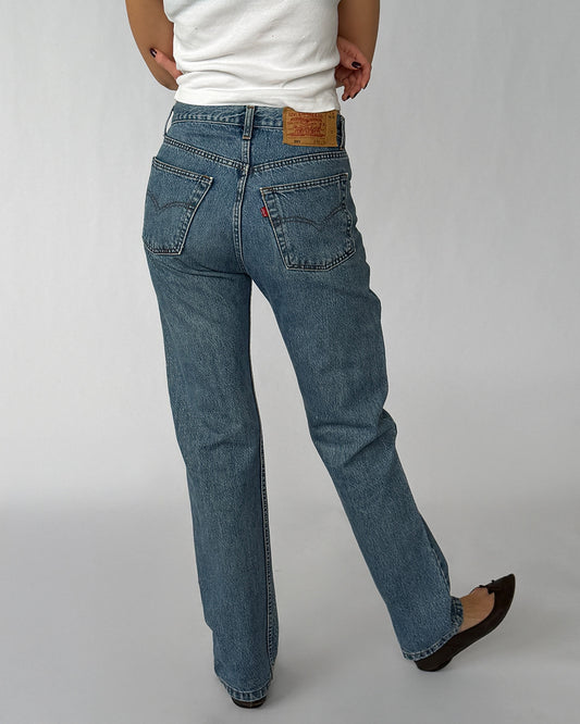 Back view of vintage Levi's 501 jeans with medium wash and straight leg