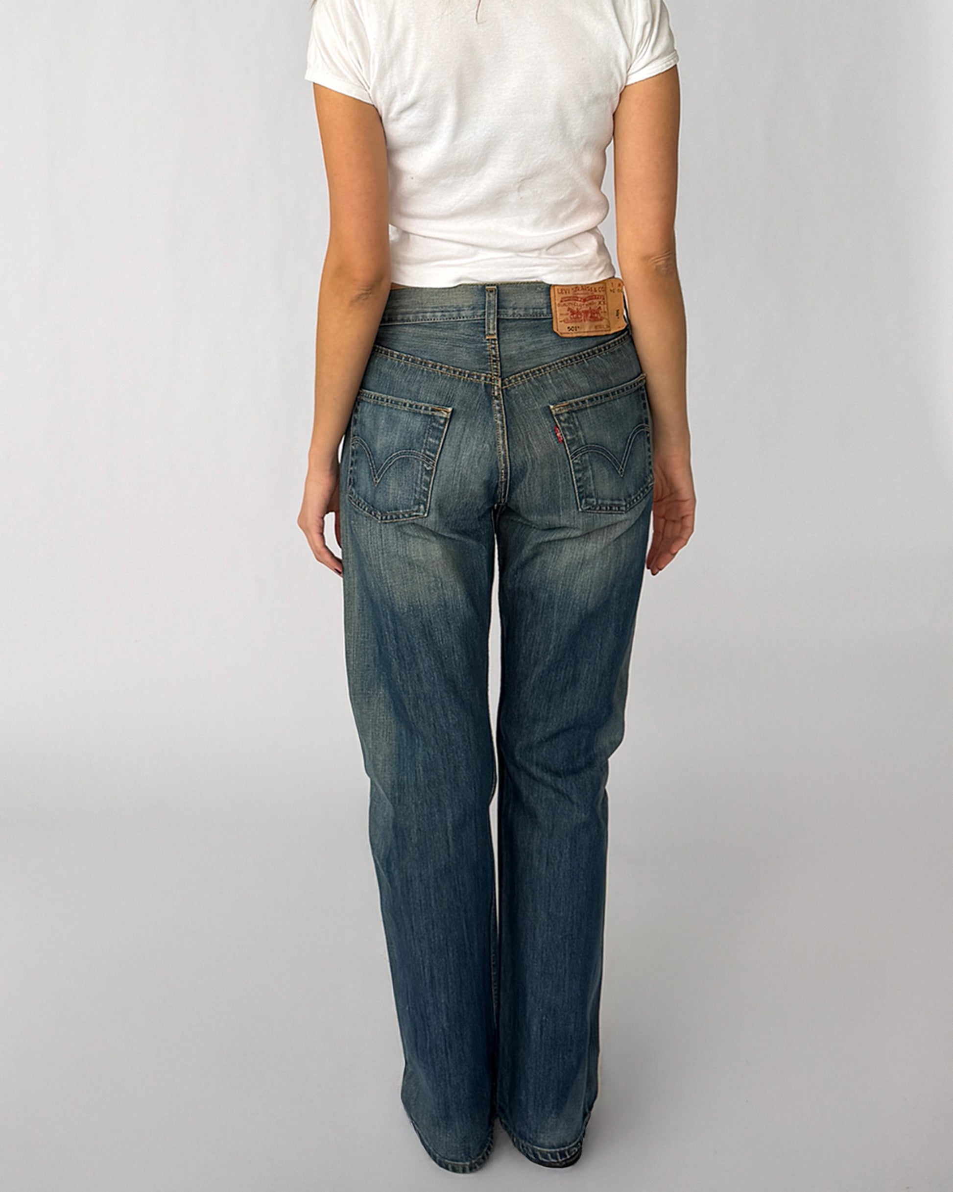 Back view of vintage Levi's 501 jeans in medium wash 