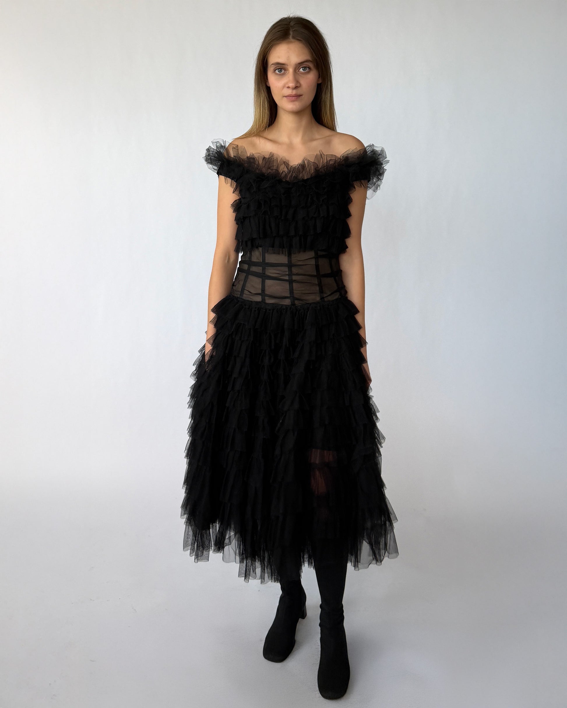 Vintage tulle dress with ruffled layers and boned bodice pictured on model