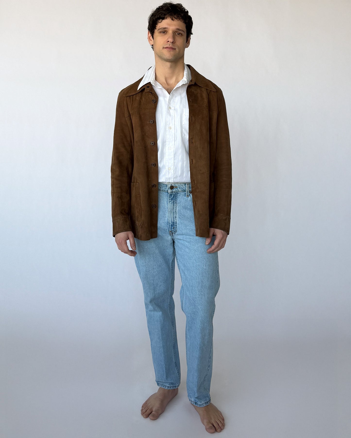 Vintage men's suede coat worn on model