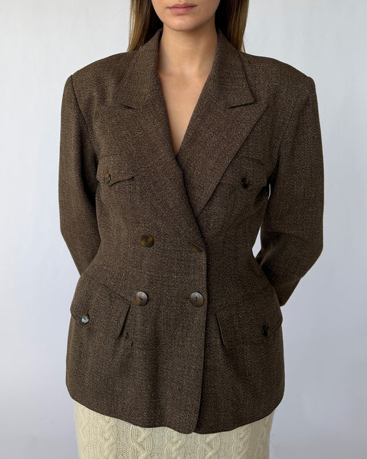 Close up view of vintage Yanedo Kasuko wool structured blazer