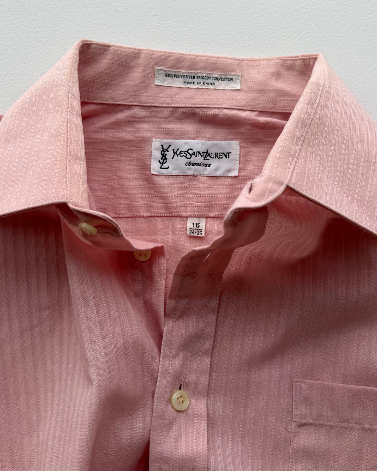 Yves Saint Laurent label on vintage button up men's shirt